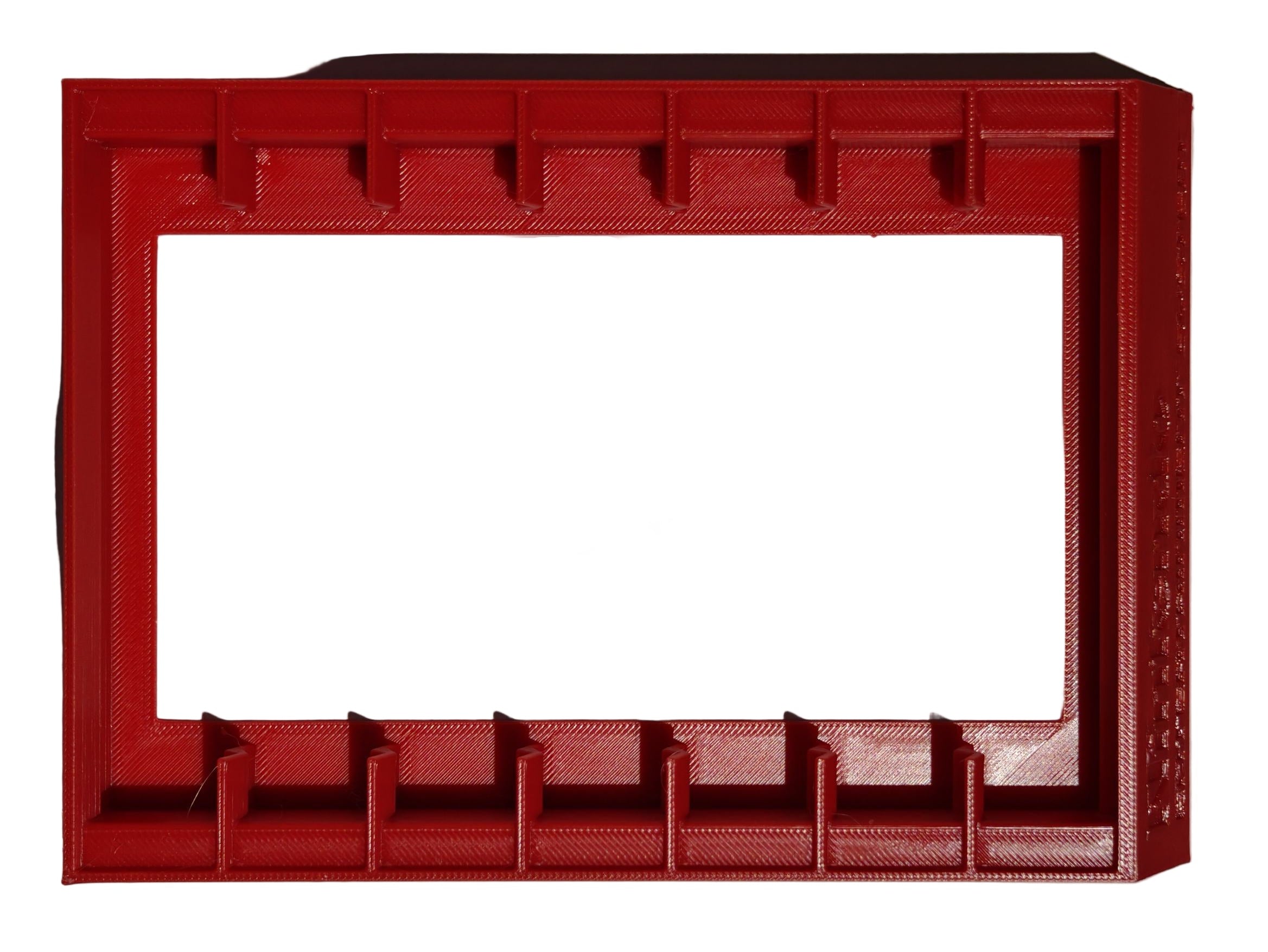 Red 3D-printed frame on a gray background
